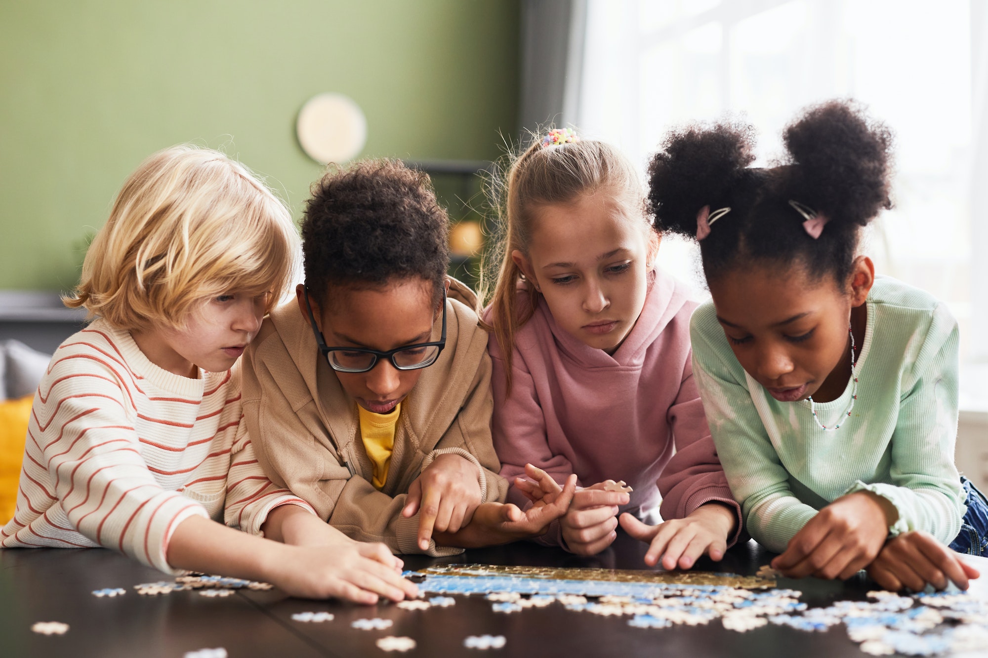 Group of Kids Playing with Puzzle